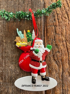 Jolly Santa Holding Red Sack Filled With New York City LandMark Ornament Personalization